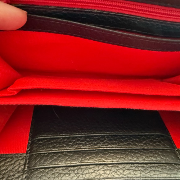 Dooney & Bourke Pebble Leather Black and Tan zip Wallet with Gold Accents - Picture 9 of 13